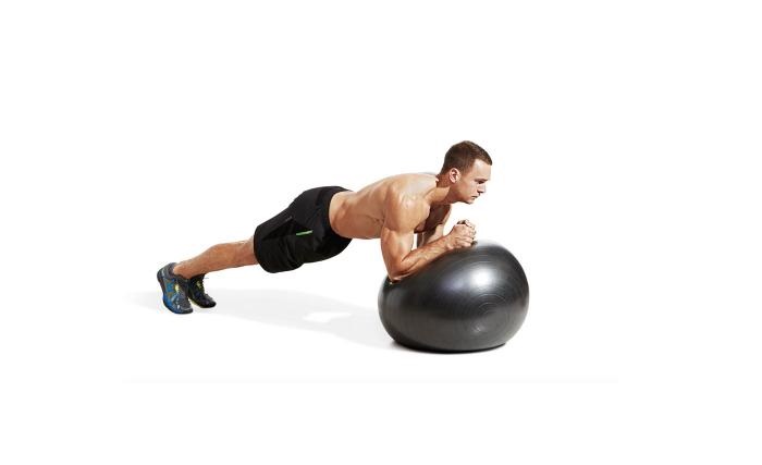 how to perform the swiss ball plank exercise https://get-strong.fit/Your-Swiss-Ball-Plank-How-To-Exercise-Guide/Exercises